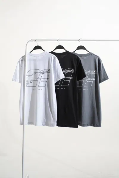  REMERA REGULAR "DETERMINED"