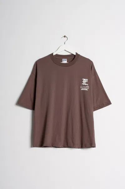 REMERA BOXY "LOST MANAGEMENT CITIES"