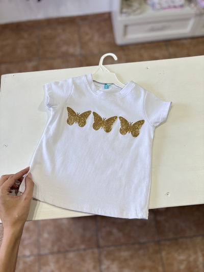 Remera mariposa glitter