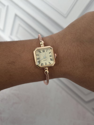 RELOJ ANDREA DORADO 