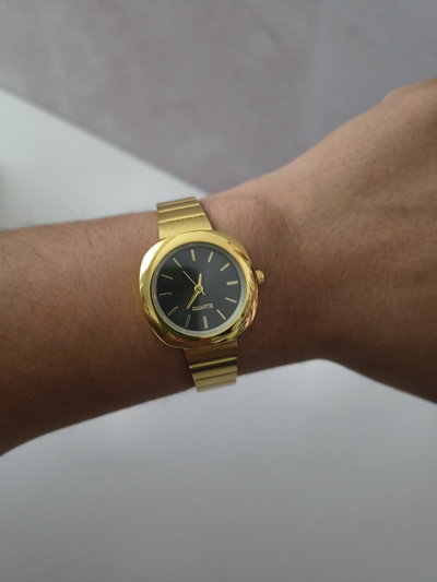 RELOJ DALMA DORADO F. NEGRO
