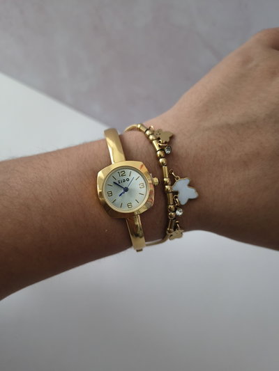 RELOJ SUIZA DORADO 