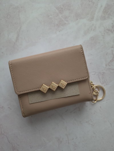 B. POCKET FRANCIA  BEIGE