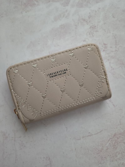 B. SIMPLE CHICO ROMINA BEIGE 