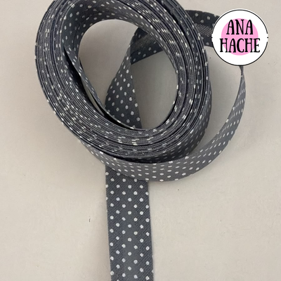 Gris con lunares