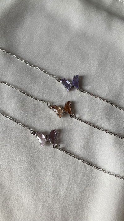 Pulsera con dije de mariposa 