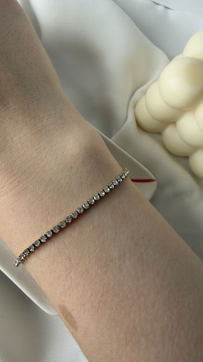 Pulsera dorada brillosa