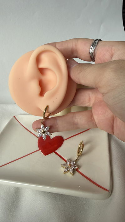 Aros con dije de flor 