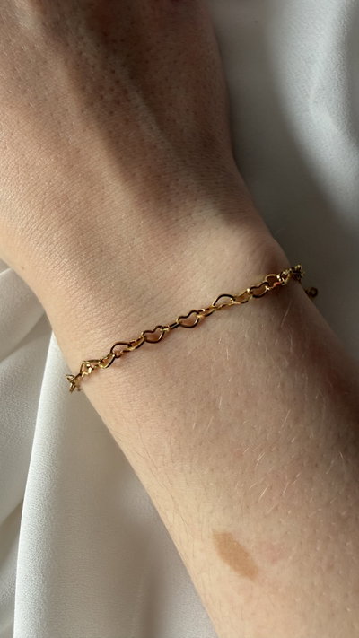 Pulsera corazones cruzados 