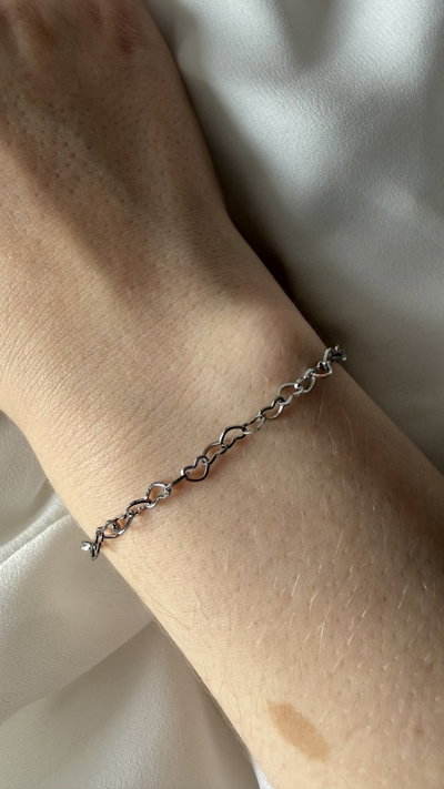 Pulsera corazones cruzados 