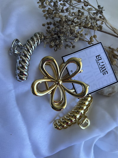 Broche flor dorado 