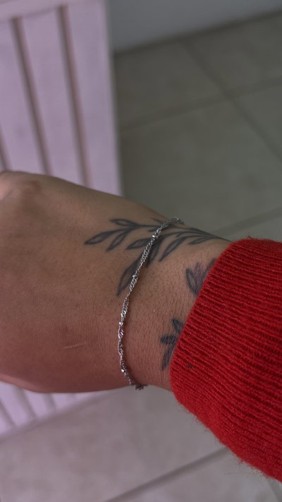 Pulsera acero trenzada/pelotitas 