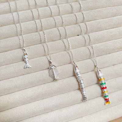 Collares de Peces en Acero Blanco