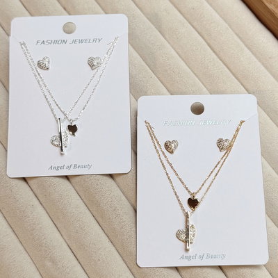 Set de Aros y Collar en Acero Blanco y Dorado