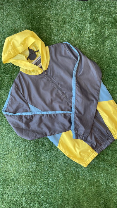 CAMPERA ROMPEVIENTOS AMARILLO 
