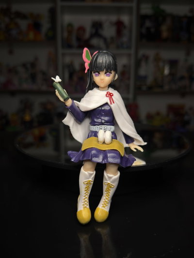 KANAO TSUYURI SENTADA COMIENDO (13CM) FIGURA DEMON SLAYER - GIRUTOYS
