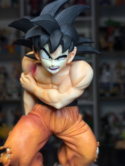 GOKU VERSIÓN HERIDO CON DAÑO (20CM) FIGURA DRAGON BALL - GIRUTOYS