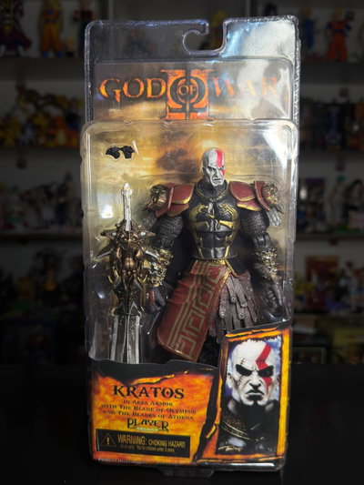 KRATOS CON ARMADURA DE ARES SERIO (18CM) FIGURA NECA - GIRUTOYS