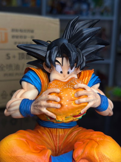 GOKU SENTADO COMIENDO HAMBURGUESA JT STUDIO (15CM) FIGURA DRAGON BALL - GIRUTOYS