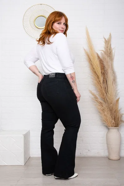 Boot Cut negro hasta talle 64