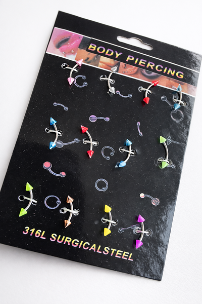 PACK X12 - PIERCING CEJAS COLORES