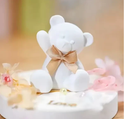 osito sentado con moño