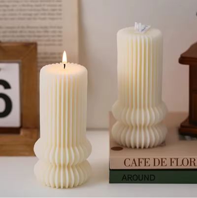 vela pilar rayado