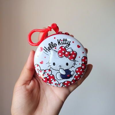 LLAVERO MONEDERO CON CARAMELOS SABOR FRUTILLA DISEÑO HELLO KITTY 24 GRS.