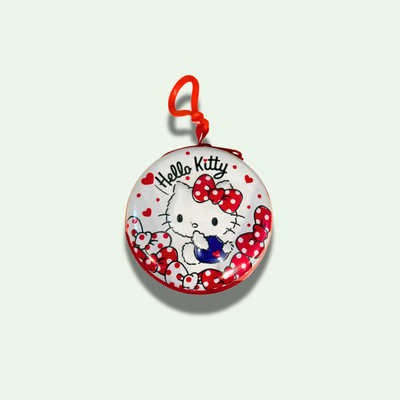 LLAVERO MONEDERO CON CARAMELOS SABOR FRUTILLA DISEÑO HELLO KITTY 24 GRS.