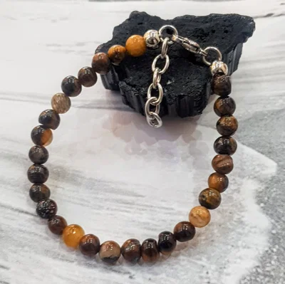 Pulsera Ojo de Tigre Natural con Cierre de Acero Quirúrgico | NEMFuerza