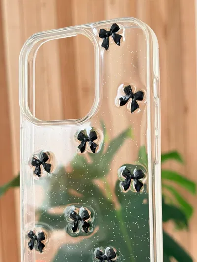 Funda transparente moños negros