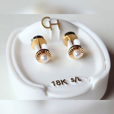 Abridor CH. Modelo 719. Oro 18 kt. Facetado Con Perla. Linea ECO