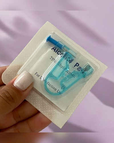 Perforadora de oreja con aro de AQ