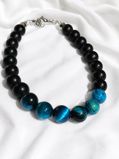 Pulsera Hombre. Ónix Negro y Ojo de Tigre Azul. 8mm