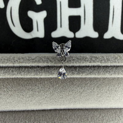 Labret mariposa colgante titanio