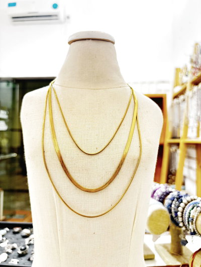 collar triple acero dorado