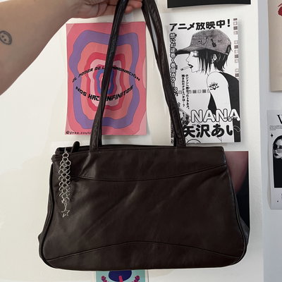Cartera + charm