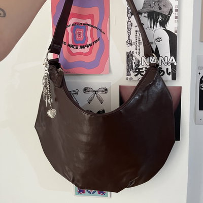 Cartera + charm