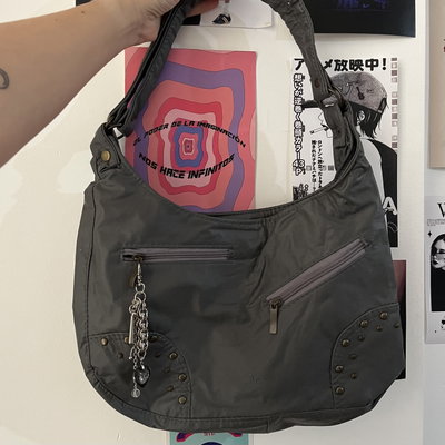 Cartera + charm