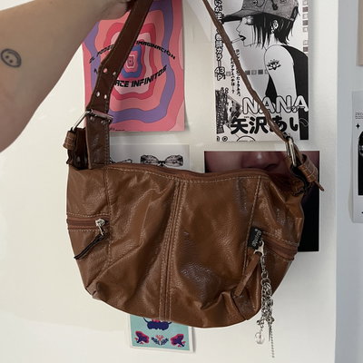 Cartera + charm