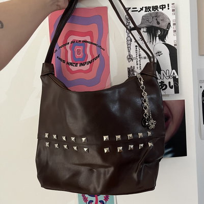 Cartera + charm