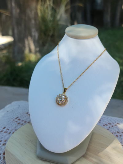 Collar Flor Giratorio