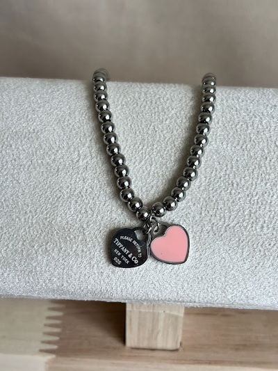 PULSERA TIFFANY DOBLE CORAZON PLATEADA CON ROSA 