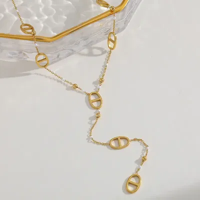 CORBATERO GUCCI DORADO