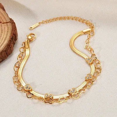 PULSERA DOBLE CORAZONES DORADA