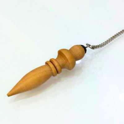 Pendulo de madera Karnak