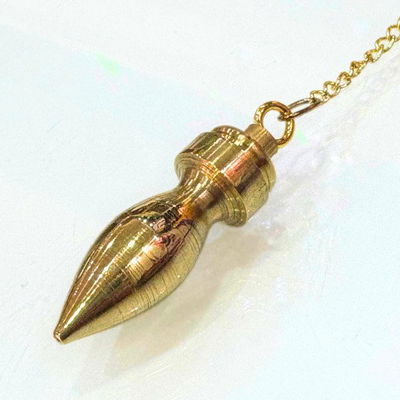 Péndulo egipcio de bronce