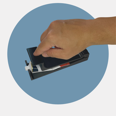 Exprimidor de tubo por compresión con ventosas 