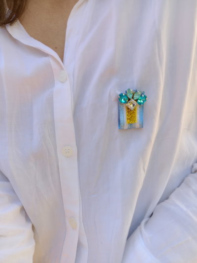 Prendedor patrio Lupe 