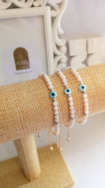 Pulsera de hilo • Cristal Banco + Ojito 